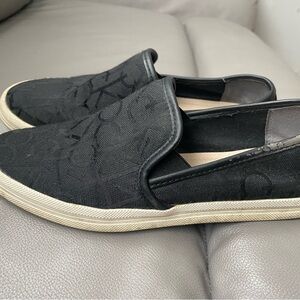 Calvin Klein Black Slip-On Sneakers with Ivory Sole